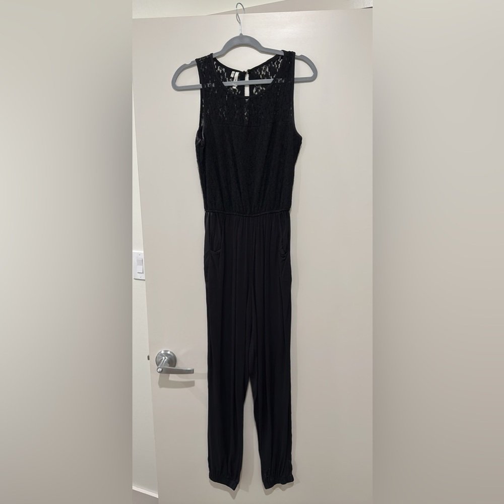 small woman’s black jumpsuit
